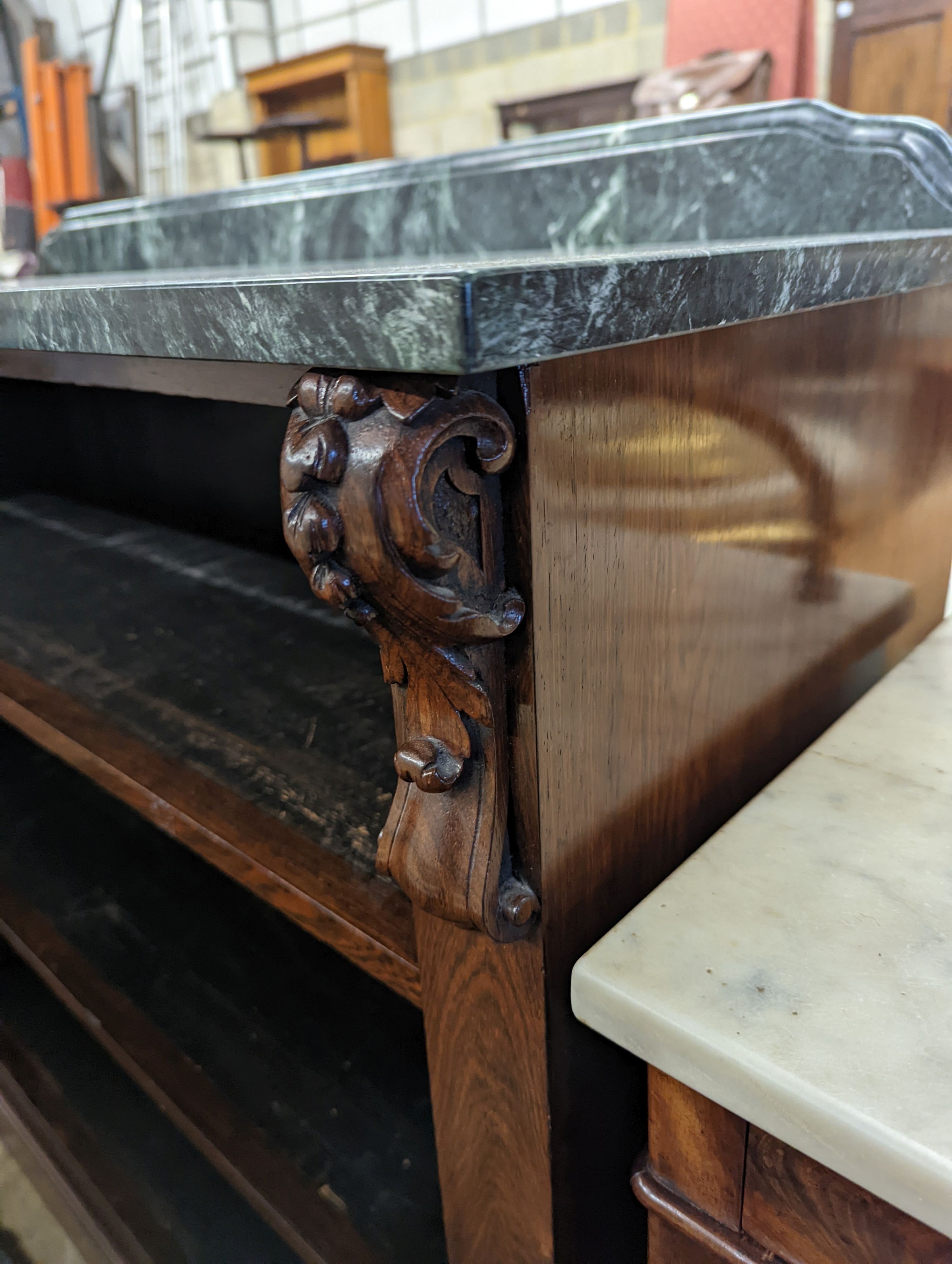 A Victorian rosewood dwarf open bookcase (replacement marble), width 110cm, depth 40cm, height 106cm